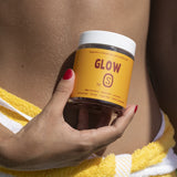 Bottle of Solara GLOW tanning gummies