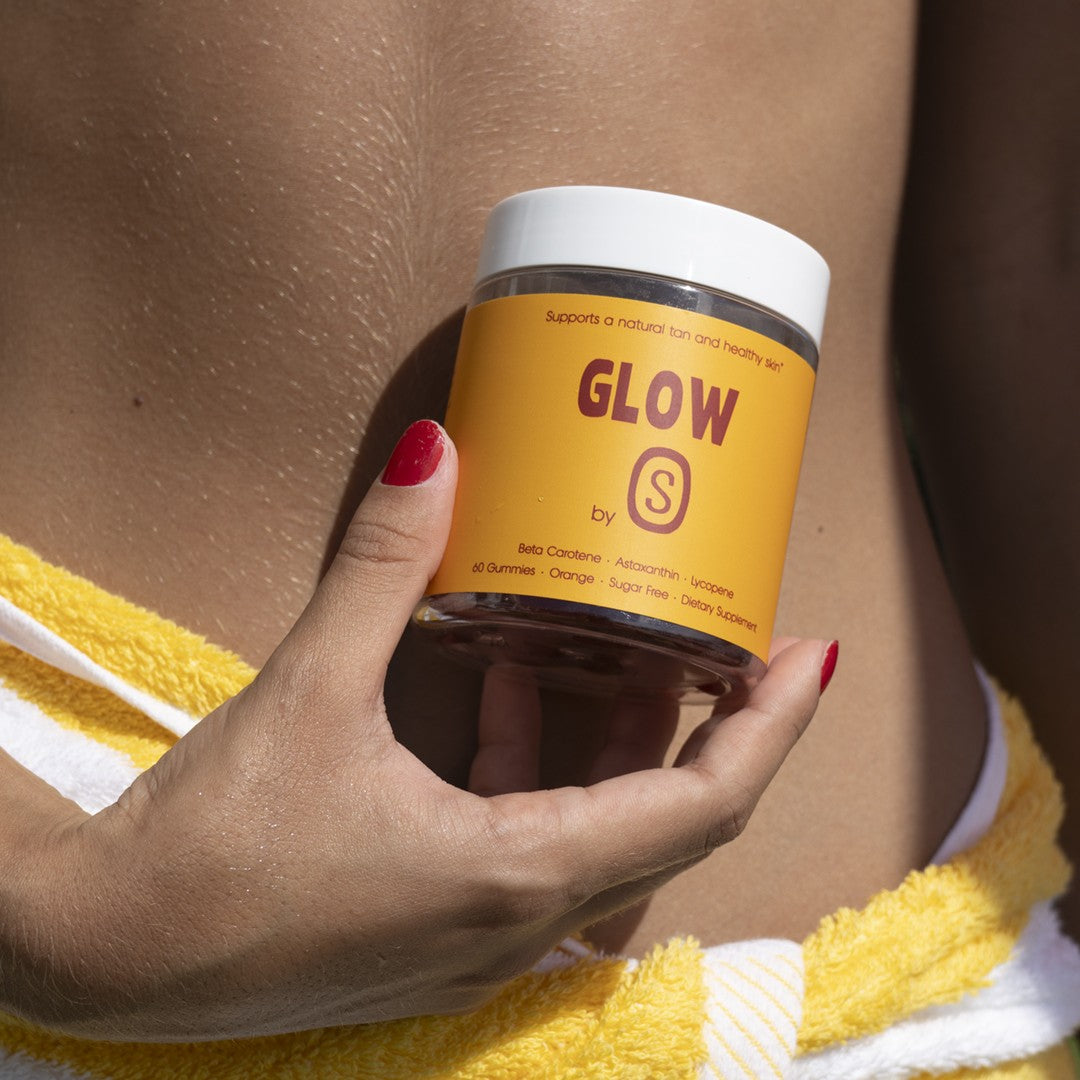 Bottle of Solara GLOW tanning gummies